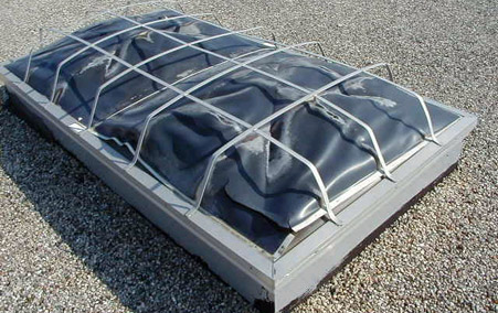PVC smoke vent with degraded, broken outer domes