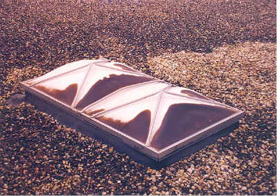PVC smoke vent with degraded, broken outer domes